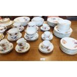 A Royal Worcester Evesham dinner service comprising:- eight dinner plates, eight breakfast plates,