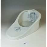 A 'New Slipper' china bed pan