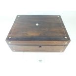 A Victorian rosewood work box with mother of pearl inlay, lacking interior, 30cm wide
