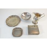 A group of silver items including pin dish, small salver and cream jug (total 285g) plus a silver