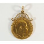 A 1907 gold sovereign on 9 ct gold mount, condition - fine