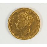 A gold sovereign, George IV 1825, crowned shield, heart version semee. Condition: Fine