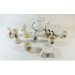 A Beswick duck pin dish, a Beswick duck No. 760, a Grays & Sons hunting teapot and various crested