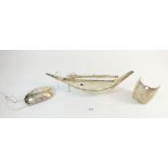 An Eastern white metal model of a junk boat - distressed condition, 480g