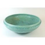 A Royal Lancastrian green pottery bowl, 27cm diameter