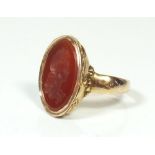 A 14 ct gold large Georgian oval gentleman's seal ring set cornelian carved with cameo bust of a