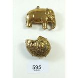 A brass elephant novelty vesta and a shell form vesta