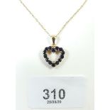 A 9 carat gold sapphire set heart form pendant on 9 carat gold chain and another fine gold chain