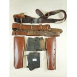 Three leather military belts with brass buckles and fixings and two pairs of military leather