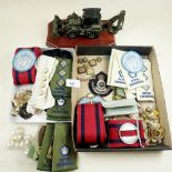 A box of various military collectables