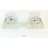 A pair of Art Deco clear glass inkwells