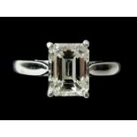 A fine 18 ct white gold emerald cut diamond solitaire ring, size L, the diamond 1.34 ct