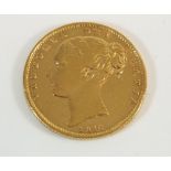 A gold sovereign , Victoria 1849 second head, shield, WW in relief. Condition: Fair