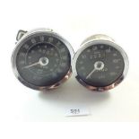 Two vintage Smiths speedometers for a motor car, model numbers SN-5230/13 and SN-6201/08AS