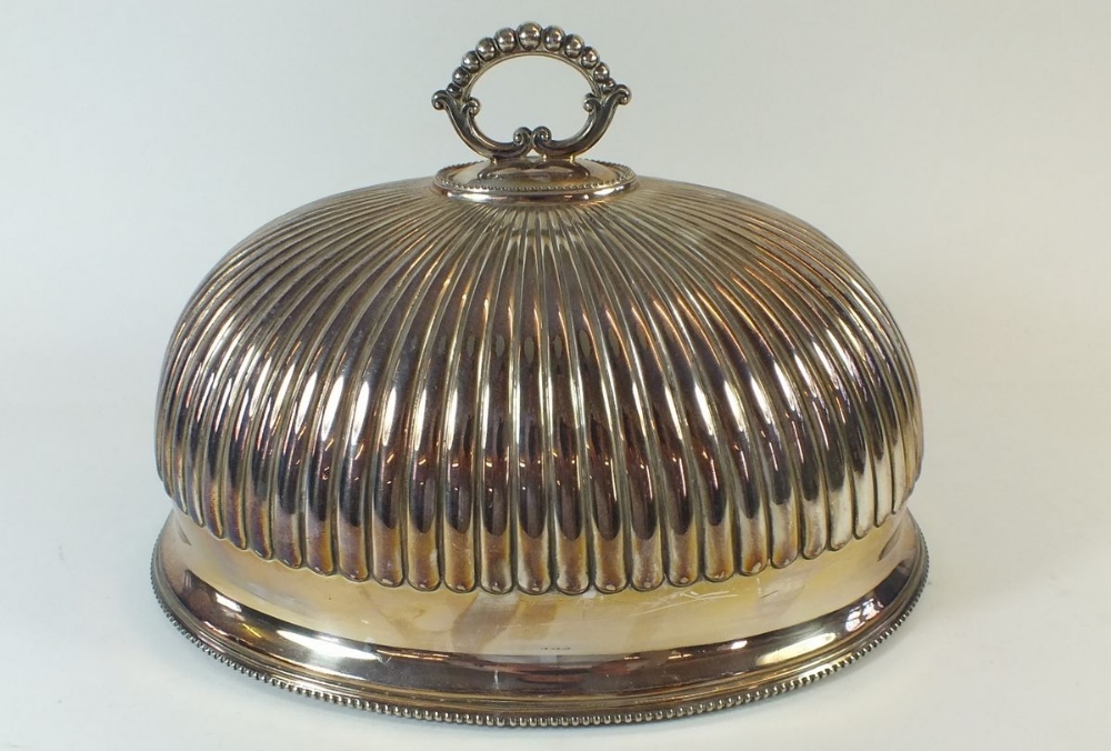 A small oval silver plated meat cover - 31cm