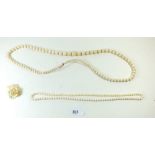 Two Victorian ivory bead necklaces and a carved ivory floral pendant