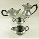 A 'Barkers' English hand hammered pewter four piece teaset