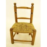 A small child's string top chair