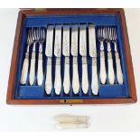 A 19th century cased set of mother of pearl handled and silver plated dessert knives and forks for