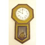 A painted wall clock with octagonal face - 56cm