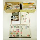 Boxed collected of British Empire commonwealth and rest of world stamps in two albums, tin, and