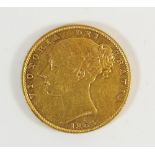 A gold sovereign, Victoria 1863 second head, shield, WW in tran. Condition: Fine