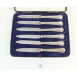 A cased set of six silver handled knives - Sheffield 1925.