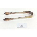 A silver pair of sugar tongs London 1827, Maker WB