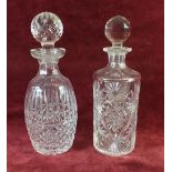 Two cut glass decanters