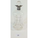 A Dutch four section glass decanter with silver collar