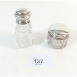 A silver topped cut glass scent bottle with stopper - London 1922 and silver topped toiletry pot