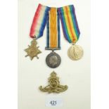 A WWI trio with cap badge to: Gunner T G Burden 1800 RFA x 825597 Royal Artillery