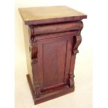 A 19th century mahogany pedestal cupboard with scrollwork brackets to cupboard - lacking back