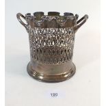 A silver bottle holder with pierced decoration and sinuous rim, Birmingham 1926 by Alexander