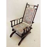 An American turned wood rocking chair