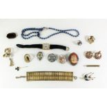 A box of vintage costume jewellery and watches