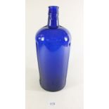 A large blue glass chemists poison bottle, 32cm