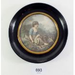 An early 19th century mezzotint of a shepherdess 'A Girl of Carnarvonshire' 10cm diameter