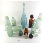 A selection of various glass bottles to include beer, mineral water and others