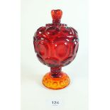 An early 20thC carnival glass/pressed glass pedestal bon bon with lid in the Amberina colourway.