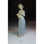 A Nao porcelain figure, 'My Little Bouquet'