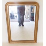 A Victorian arch top gilt framed mirror 104 x 74cm