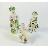 Two 19th century porcelain figures of putti and a similar later Naples small figurine of a cherub,