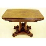 A Victorian rosewood rectangle folding top card table on four swept and reed scroll end supports