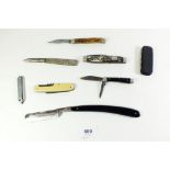 A group of penknives and cut throat razor