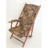 A 19th century folding mahogany campaign chair