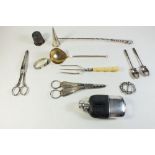 A group of silver plated items, hip flask, grape scissors etc
