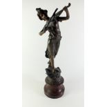 A late 19thC spelter figure of a musician.