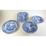 A large Spode Italian circular platter and three serving dishes