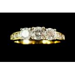 An 18ct gold fine three stone diamond ring on diamond set shoulders, 3.7g, size L